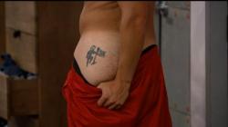 Hayden showing off his tattoo