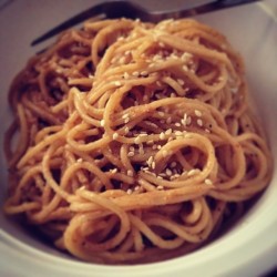 Spicy ginger peanut noodles. Homemade sauce. Sesame seeds   This