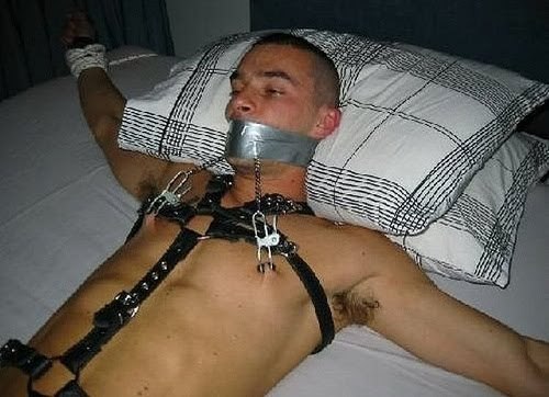 slavethompson:  faggland:  Every time he moves his head, his torture grows.  Sweet 