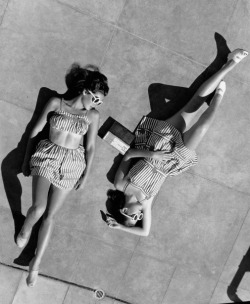 summers-in-hollywood: Gene Tierney sunbathing with her sister