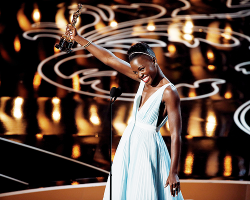 delevingned-deactivated20151023:  Lupita Nyong’o accepts the