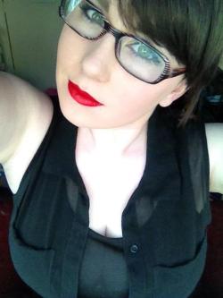 vixgreen:  Red lipped, boobie showing chubby girl. 