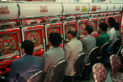 unearthedviews:JAPAN. Tokyo. Pachinko players at Ueno area. 1996.