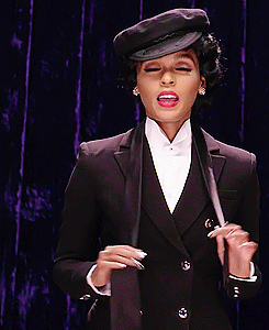 12graphics:   Janelle Monaé Ties a Windsor Knot While Impersonating