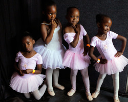 letswakeupworld:  Young ballerinas pose as they prepare to go