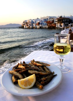 yourlovelifeworld:  Greek Food and Wine in a sunset restaurant