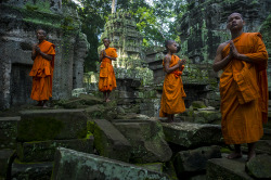 yohji1:Buddhist Monk Tak Tak (left) at Ta Prohm Temple in the