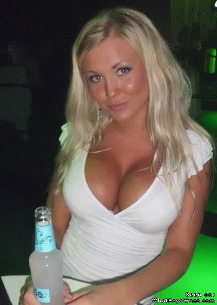 bimboreality:  What is nice with this shot is how the girl is aware that it’s not just her face, but the combination with her tits that make the shot work. This girl is aware of the effect her fake tits have and she’s confident to show them off. 