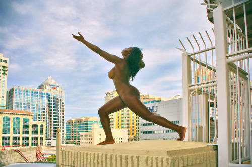 Bold scenes raise spirits and interest in nude exercise and artful presentations.  nudepageant:  random mornings - ebony female nude on rooftop by Naveed Thomas   