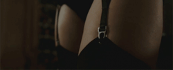 Adjusting her garters… Selena Kitt