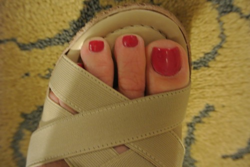 Thinking I am going with this color today when I get my toes done.  This is an old picture, but seems like a “summery” color.  The sand from our vacation is great to smooth up my soles, but a killer on the polish.  What do you think?