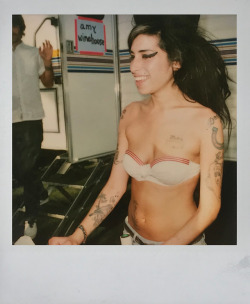 amyjdewinehouse:  Amy Winehouse and Alex Turner at Coachella,