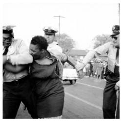  Woman resisting arrest in Birmingham, Alabama April 14th, 1963