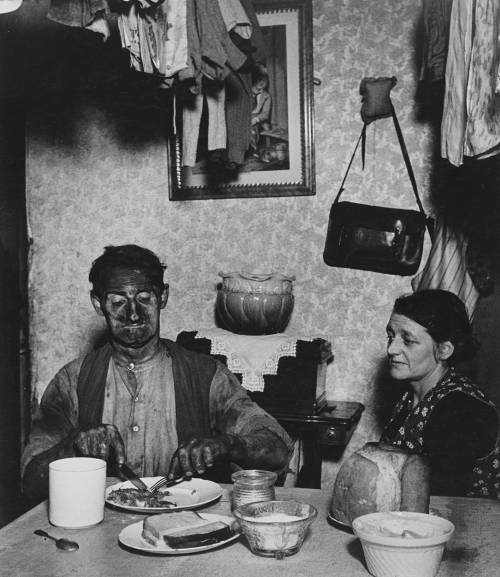 Bill Brandt - Northumbrian Miner at His Evening Meal, 1937. Nudes