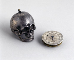 sixpenceee:  Pocket watch concealed in a memento mori, 1700-1936. The