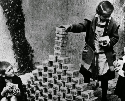   German children play with stacks of money during the hyperinflation