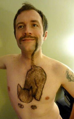 laughingsquid:  Man Grows a Spectacular Cat-Themed Mustache for