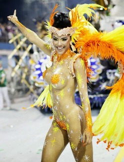 Naked woman in body paint at a Brazilian carnival.