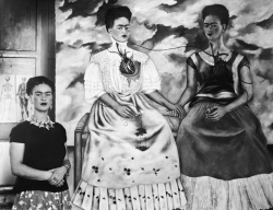 satya-:Frida Kahlo photographed next to “Las Dos Fridas”.This