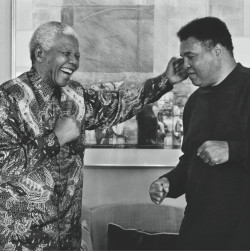 historicaltimes:  Muhammad Ali shapes up with Nelson Mandela