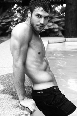 jaygordon1981:  Scruffy lean young stud in the pool in black