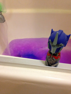 Optimus seems pleased with the color of the bath salt I’m using