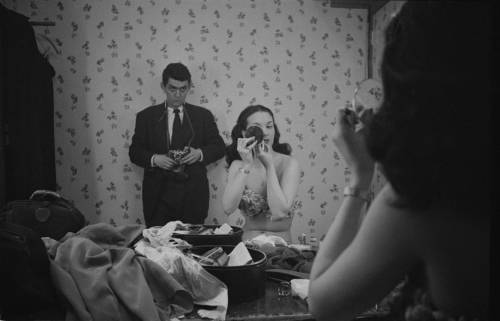 Stanley Kubrick - Kubrick is reflected in a mirror as he photographs