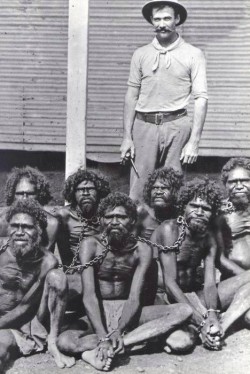 historicaltimes:  Australian man stands with his captive and