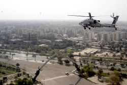 militaryarmament:  A U.S Army AH-64 Apache flying over the Victory