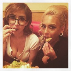 Beautiful babes sensually eating nachos 