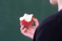 williamhackerphoto:Girl eating an apple on 6th aveManhattan,