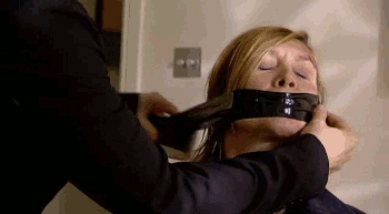 boundsilence:  In the episode “Caught by the Killer” in the cop drama “The Bill,” Sally Rogers finds herself waking up bound and gagged in a bath tub. With a very nice wraparound tape gag, and some tape around her wrists and ankles, she manages