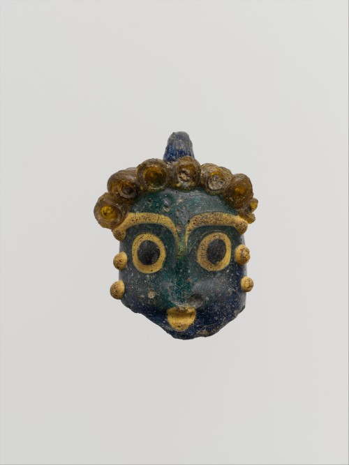ancientart:  Phoenician or Carthaginian glass head pendants. The first dates to theÂ 5th century BCE, the second to theÂ mid 4thâ€“3rd century BCE, the third to ca. 450â€“300 BCE, and the fourth to theÂ 5th century BCE. Courtesy & currently located