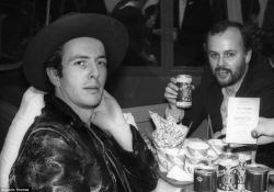 theunderestimator-2:  Joe Strummer and John Peel enjoying junk