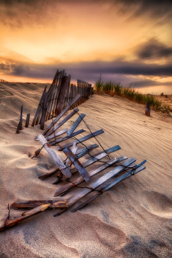 btruono:  Broken Boundaries The salty breeze lifts the sand into