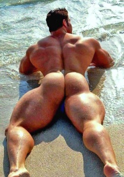 Barry laid in the sun at the beach. His humongous ass teeming