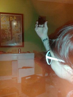 My band mate lofididntdie checking herself out in a bottle opener.