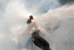 inothernews:  BLOWBACK  Police fired water at a protester during