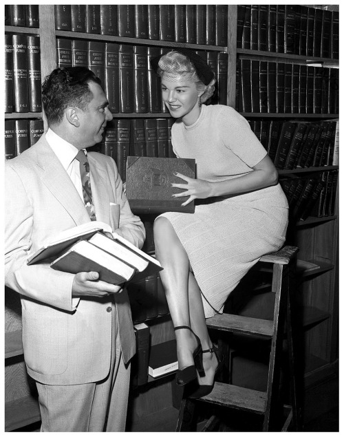 THERE’S NO SUCH THING AS BAD PUBLICITY!Vintage press photo from August of ‘52 features Burlesque dancer Gay Dawn posing with her attorney: Marvin Lewis.. Lewis would represent Ms. Dawn and 5 other dancers facing indecency charges..  The 6