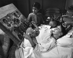 lazypacific: Frida Kahlo painting in bed. After her accident,