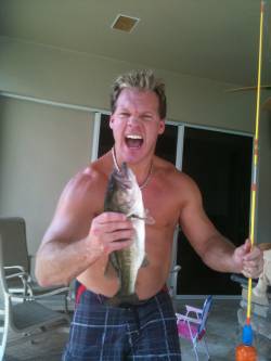 ehysexyman:  He’s hot even with a big fish in the hand.