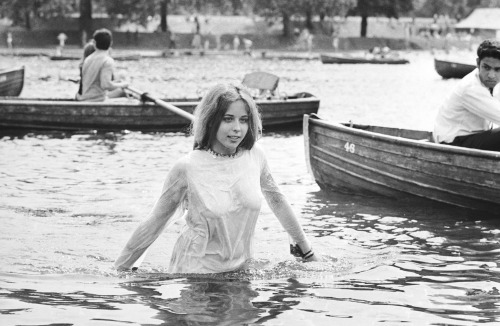 A teenage girl cooling off in the Serpentine during the Rolling