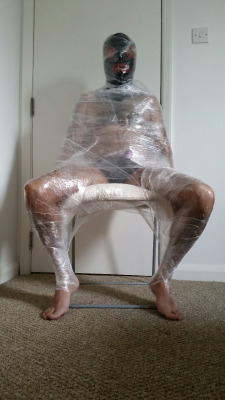 Slave Qwerty has an encasement fetish, so I wrapped him up in some cling film, and teased his cock with a vibrator. London, April 2015.