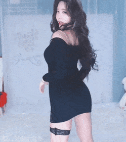 Cute Asian Girl Teasing in Tight Dress (x-post /r/cumtributekpop)