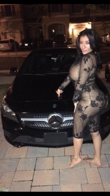 Why she go outside and pose with the Benz like that? Them trees