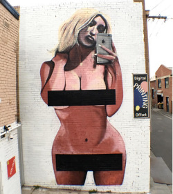 papermagazine:   There’s a Three-Story Mural of Kim’s Nude