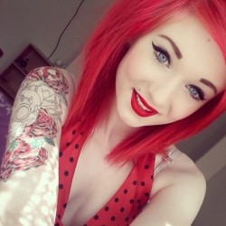 plasticsmooth:  Smiles because it’s sunny #redhead #tattoo