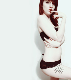 Nymphetamine is one desirable redhead in this suggestive pose.