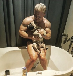 Brodie Robertson - Giving his doggo an unwelcome bath.
