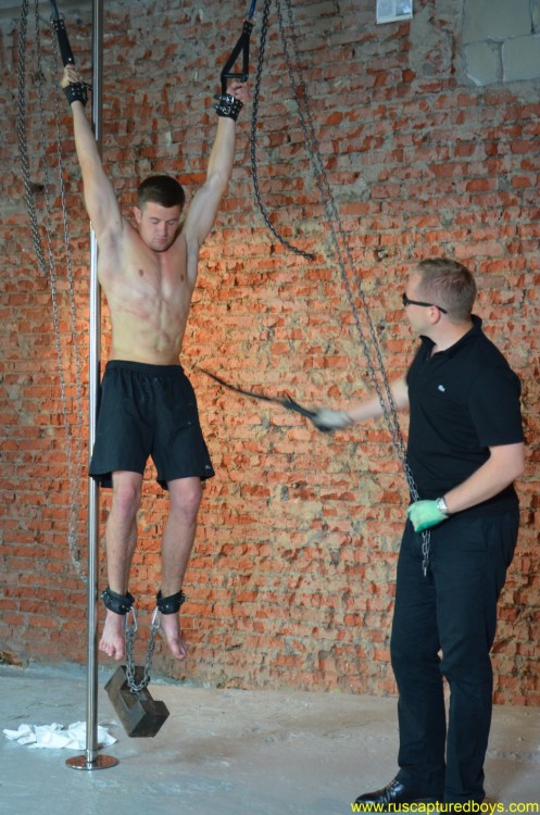 muscled stud suspended and flogged closeties1:  “Captured Worker” pt.1` 